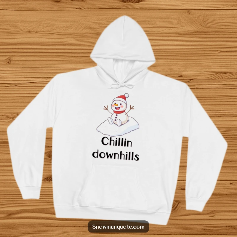 Funny Playful Snowman Hill Hoodie featuring a happy snowman sliding down a snow-covered hill with a joyful whoop.