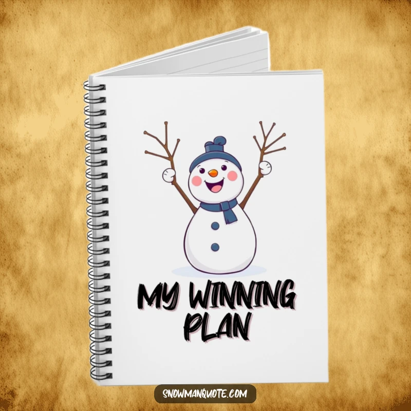 Funny notebook illustrated with an excited snowman cheering with twig arms held high, ideal for jotting down inspiring thoughts.