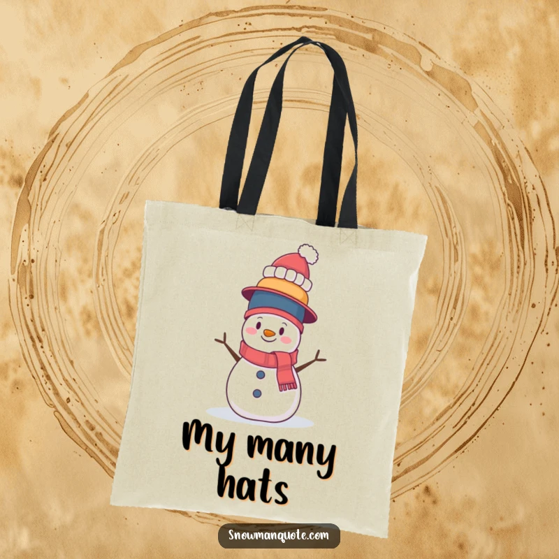 Funny tote bag featuring a wobbly snowman balancing a tall stack of hats. Practical for errands, humorous for everyday life.